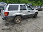 ✅ 2004 Jeep Grand Cherokee Laredo • VIN: 1J4GW48S34C184715 • Лот: 57272955. Опубликован ранее на Copart с пробегом 245 902 миль. Бесплатный доступ к архиву аукционных продаж из США и подробный отчёт об истории автомобиля на DreamBid. Изображение 3.