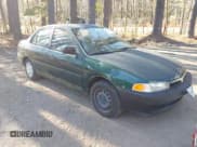 ✅ 2001 Mitsubishi Mirage ES • VIN: JA3AY26C01U042235 • Lot: 41899635. Listed on IAAI with 101,058 mi. Free auction sales archive from the USA and detailed vehicle history report at DreamBid. Image 1.