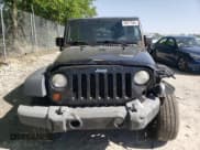✅ 2007 Jeep Wrangler Unlimited Rubicon • VIN: 1J4GA69157L162476 • Lot: 56277085. Wystawiony na Copart z przebiegiem 127 084 mil. Bezpłatny archiwum sprzedaży aukcyjnych z USA i szczegółowy raport historii pojazdu na DreamBid. Zdjęcie 5.