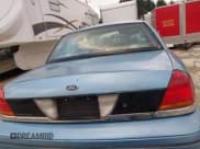 ✅ 2000 Ford Crown Victoria • VIN: 2FAFP72W4YX181431 • Лот: 41514424. Опубликован ранее на IAAI с пробегом 265 834 миль. Бесплатный доступ к архиву аукционных продаж из США и подробный отчёт об истории автомобиля на DreamBid. Изображение 16.