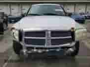 2005 Dodge Dakota SLT с VIN 1D7HE48N95S275735, выставлен на аукционе Copart как лот 57578015 с пробегом 254 168 миль миль и Списание • Salvage title. История ставок и продаж доступна на DreamBid. Изображение 5.