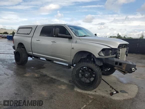 ✅ 2012 Ram 2500 SLT • VIN: 3C6UD5ML9CG212300 • Lot: 70142345. Wystawiony na Copart z przebiegiem 172 845 mil. Bezpłatny archiwum sprzedaży aukcyjnych z USA i szczegółowy raport historii pojazdu na DreamBid. Zdjęcie 4.
