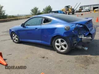 2005 Hyundai Tiburon GS с VIN KMHHM65D55U174406, выставлен на аукционе Copart как лот 64487555 с пробегом 206 900 миль миль и Списание • Salvage title. История ставок и продаж доступна на DreamBid. Изображение 2.
