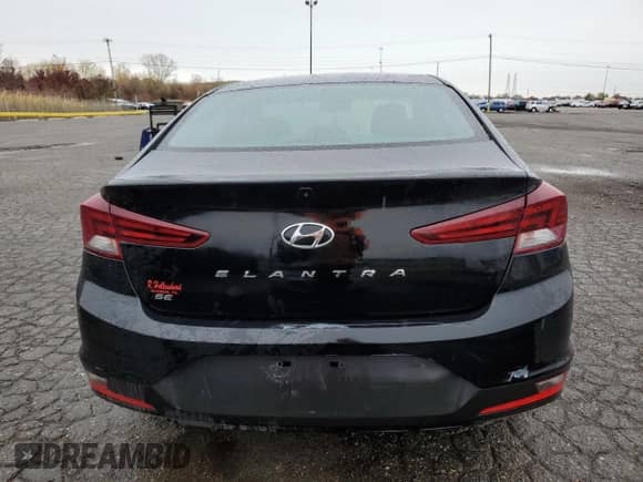 2020 Hyundai Elantra SE z VIN KMHD74LF0LU965079, wystawiony jako Copart lot #90737525 z przebiegiem 125 870 mil mil oraz Czysty tytuł • Clean title. Historia ofert i sprzedaży dostępna na DreamBid. Obrazek 6.