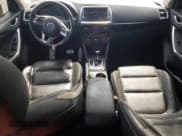 ✅ 2014 Mazda CX-5 Grand Touring • VIN: JM3KE2DY7E0387232 • Lot: 69195815. Listed on Copart with 204,436 mi. Free auction sales archive from the USA and detailed vehicle history report at DreamBid. Image 8.