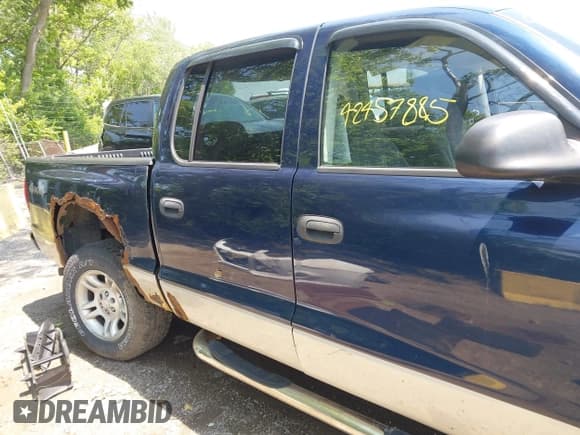✅ 2004 Dodge Dakota SLT • VIN: 1D7HG48N94S643579 • Lot: 42457885. Listed on IAAI with 165,445 mi. Free auction sales archive from the USA and detailed vehicle history report at DreamBid. Image 13.