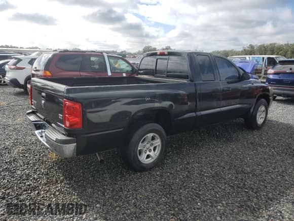 2006 Dodge Dakota SLT z VIN 1D7HE42N26S666249, wystawiony jako Copart lot #82193124 z przebiegiem 195 817 mil mil oraz Szkoda całkowita • Salvage title. Historia ofert i sprzedaży dostępna na DreamBid. Obrazek 3.