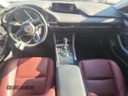 ✅ 2024 Mazda 3 S Carbon Edition • VIN: 3MZBPBCM4RM412654 • Lot: 92630065. Listed on Copart with 10,776 mi. Free auction sales archive from the USA and detailed vehicle history report at DreamBid. Image 8.