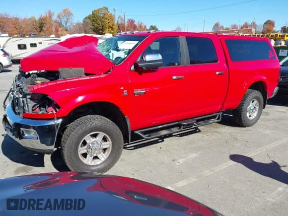✅ 2012 Ram 2500 Laramie • VIN: 3C6UD5FL9CG106183 • Lot: 43598403. Wystawiony na IAAI z przebiegiem 150 004 mil. Bezpłatny archiwum sprzedaży aukcyjnych z USA i szczegółowy raport historii pojazdu na DreamBid. Zdjęcie 2.