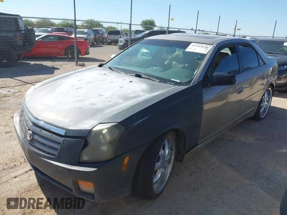 ✅ 2003 Cadillac CTS • VIN: 1G6DM57N030165770 • Lot: 42762640. Listed on IAAI with 143,599 mi. Free auction sales archive from the USA and detailed vehicle history report at DreamBid. Image 2.