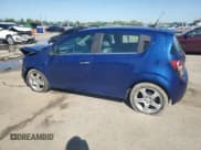 ✅ 2012 Chevrolet Sonic LTZ • VIN: 1G1JE6SH2C4211444 • Lot: 54013075. Listed on Copart with 97,378 mi. Free auction sales archive from the USA and detailed vehicle history report at DreamBid. Image 2.