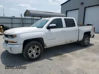 2017 Chevrolet Silverado 1500 LT with VIN 3GCUKREC3HG249466, listed as a Copart auction lot 58291405 with 142,196 mi miles and Clean title. Bid and sale history available at DreamBid. Image 1.
