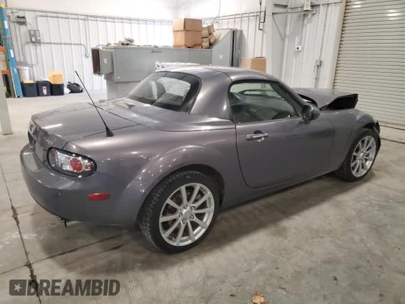 ✅ 2007 Mazda MX-5 Miata Grand Touring • VIN: JM1NC26F470129504 • Лот: 89441075. Опубликован ранее на Copart с пробегом 107 517 миль. Бесплатный доступ к архиву аукционных продаж из США и подробный отчёт об истории автомобиля на DreamBid. Изображение 3.