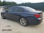✅ 2015 BMW 7 Series 750i • VIN: WBAYA8C51FG197764 • Lot: 67095554. Listed on Copart with 167,458 mi. Free auction sales archive from the USA and detailed vehicle history report at DreamBid. Image 2.