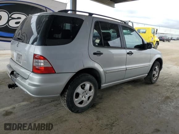 ✅ 2003 Mercedes-Benz M 350 • VIN: 4JGAB57EX3A408318 • Lot: 53401985. Listed on Copart with 179,045 mi. Free auction sales archive from the USA and detailed vehicle history report at DreamBid. Image 3.