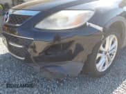 ✅ 2011 Mazda CX-9 Grand Touring • VIN: JM3TB3DV8B0306257 • Lot: 43648871. Wystawiony na IAAI z przebiegiem 176 320 mil. Bezpłatny archiwum sprzedaży aukcyjnych z USA i szczegółowy raport historii pojazdu na DreamBid. Zdjęcie 6.