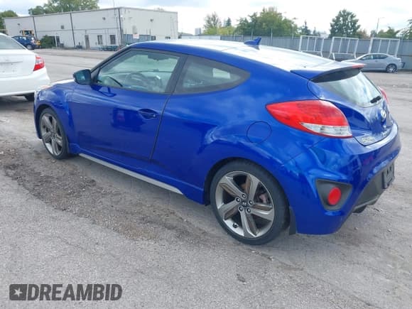 ✅ 2013 Hyundai Veloster Turbo • VIN: KMHTC6AE8DU176516 • Lot: 43166189. Wystawiony na IAAI z przebiegiem 69 989 mil. Bezpłatny archiwum sprzedaży aukcyjnych z USA i szczegółowy raport historii pojazdu na DreamBid. Zdjęcie 3.