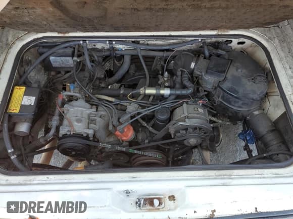 ✅ 1990 Volkswagen Vanagon • VIN: WV2YB025XLG122223 • Лот: 57179115. Опубликован ранее на Copart с пробегом 431 880 миль. Бесплатный доступ к архиву аукционных продаж из США и подробный отчёт об истории автомобиля на DreamBid. Изображение 12.