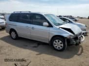 ✅ 2002 Honda Odyssey EX-L • VIN: 5FNRL18062B053900 • Lot: 68757855. Listed on Copart with 234,326 mi. Free auction sales archive from the USA and detailed vehicle history report at DreamBid. Image 4.