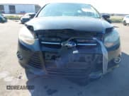 ✅ 2014 Ford Focus Titanium • VIN: 1FADP3J23EL237429 • Lot: 43358765. Listed on IAAI with 138,960 mi. Free auction sales archive from the USA and detailed vehicle history report at DreamBid. Image 6.