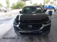 ✅ 2023 Mazda CX-30 S Premium • VIN: 3MVDMBDM1PM537755 • Lot: 42385160. Wystawiony na IAAI z przebiegiem 26 425 mil. Bezpłatny archiwum sprzedaży aukcyjnych z USA i szczegółowy raport historii pojazdu na DreamBid. Zdjęcie 12.