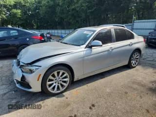 2018 BMW 3 Series 320i xDrive with VIN WBA8E5G57JNU48014, listed as a Copart auction lot 61991085 with 83,413 mi miles and Clean title. Bid and sale history available at DreamBid. Image 1.