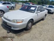 ✅ 1994 Lexus ES 300 • VIN: JT8GK13T3R0057082 • Lot: 42439019. Listed on IAAI with 164,141 mi. Free auction sales archive from the USA and detailed vehicle history report at DreamBid. Image 2.