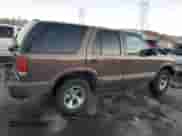 2000 Chevrolet Blazer LS с VIN 1GNCS13W7YK218263, выставлен на аукционе Copart как лот 80774144 с пробегом 76 764 миль миль и Списание • Salvage title. История ставок и продаж доступна на DreamBid. Изображение 3.