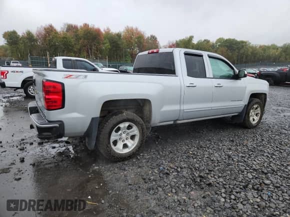 2017 Chevrolet Silverado 1500 LT with VIN 1GCVKREC4HZ326298, listed as a Copart auction lot 85676485 with 104,042 mi miles and Salvage title. Bid and sale history available at DreamBid. Image 3.