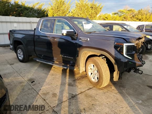 ✅ 2022 GMC Sierra 1500 SLE • VIN: 1GTRUBEDXNZ645308 • Лот: 89498065. Опубликован ранее на Copart с пробегом 69 215 миль. Бесплатный доступ к архиву аукционных продаж из США и подробный отчёт об истории автомобиля на DreamBid. Изображение 4.