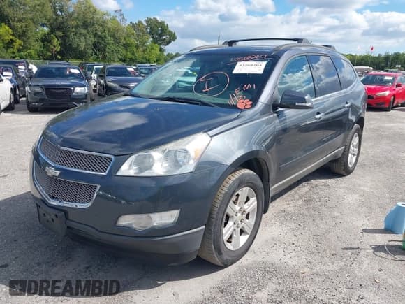 ✅ 2012 Chevrolet Traverse 2LT • VIN: 1GNKRJED3CJ400284 • Lot: 43568204. Wystawiony na IAAI z przebiegiem 167 279 mil. Bezpłatny archiwum sprzedaży aukcyjnych z USA i szczegółowy raport historii pojazdu na DreamBid. Zdjęcie 2.