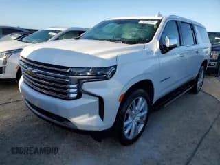 ✅ 2022 Chevrolet Suburban High Country • VIN: 1GNSKGKL3NR233657 • Lot: 74177244. Wystawiony na Copart z przebiegiem 9 111 mil. Bezpłatny archiwum sprzedaży aukcyjnych z USA i szczegółowy raport historii pojazdu na DreamBid. Zdjęcie 1.