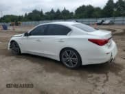 ✅ 2014 Infiniti Q50 Hybrid Premium • VIN: JN1AV7ARXEM703233 • Lot: 61407685. Listed on Copart with 114,732 mi. Free auction sales archive from the USA and detailed vehicle history report at DreamBid. Image 2.