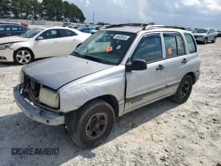 2002 Chevrolet Tracker с VIN 2CNBE13C826912290, выставлен на аукционе Copart как лот 69659335 с пробегом 153 495 миль миль и Списание • Salvage title. История ставок и продаж доступна на DreamBid. Изображение 1.