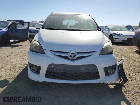 ✅ 2008 Mazda 5 Grand Touring • VIN: JM1CR293080306011 • Лот: 67790355. Опубликован ранее на Copart с пробегом 164 903 миль. Бесплатный доступ к архиву аукционных продаж из США и подробный отчёт об истории автомобиля на DreamBid. Изображение 5.