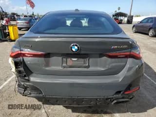 ✅ 2022 BMW 4 Series M440i xDrive • VIN: WBA13AW02NFM46340 • Лот: 39821173. Опубликован ранее на Copart с пробегом 13 789 миль. Бесплатный доступ к архиву аукционных продаж из США и подробный отчёт об истории автомобиля на DreamBid. Изображение 6.