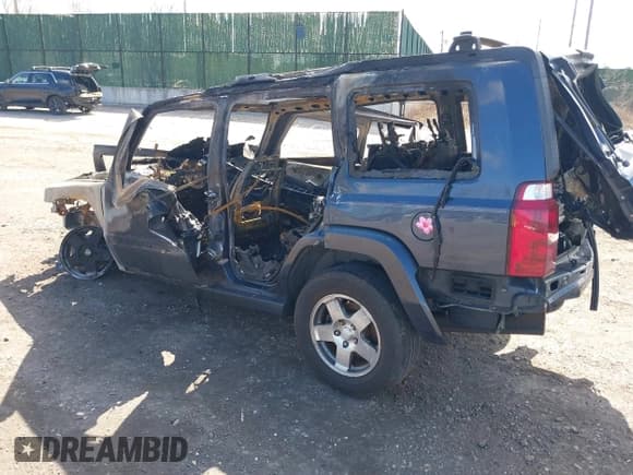 ✅ 2009 Jeep Commander Sport • VIN: 1J8HG48K09C536785 • Lot: 41739018. Listed on IAAI with 117,100 mi. Free auction sales archive from the USA and detailed vehicle history report at DreamBid. Image 3.