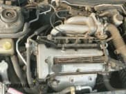 ✅ 1997 Mazda Protege DX • VIN: JM1BC1418V0165780 • Lot: 42735711. Wystawiony na IAAI z przebiegiem 65 652 mil. Bezpłatny archiwum sprzedaży aukcyjnych z USA i szczegółowy raport historii pojazdu na DreamBid. Zdjęcie 12.