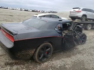 ✅ 2013 Dodge Challenger R/T • VIN: 2C3CDYBT5DH631128 • Lot: 32095142. Wystawiony na Copart z przebiegiem Nie podano. Bezpłatny archiwum sprzedaży aukcyjnych z USA i szczegółowy raport historii pojazdu na DreamBid. Zdjęcie 4.