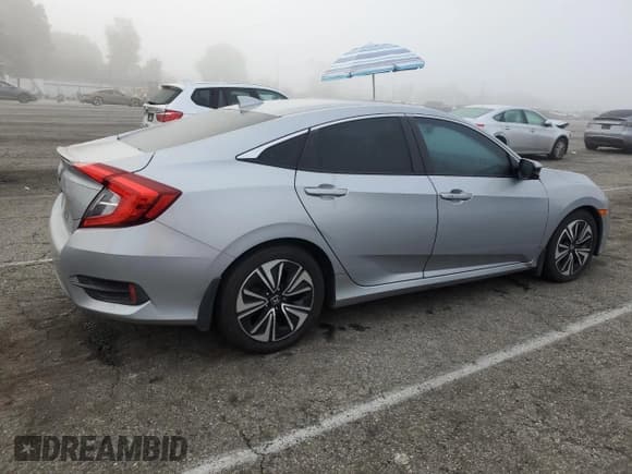 ✅ 2017 Honda Civic EX-T • VIN: 2HGFC1F32HH634444 • Лот: 90981965. Опубликован ранее на Copart с пробегом 116 565 миль. Бесплатный доступ к архиву аукционных продаж из США и подробный отчёт об истории автомобиля на DreamBid. Изображение 3.