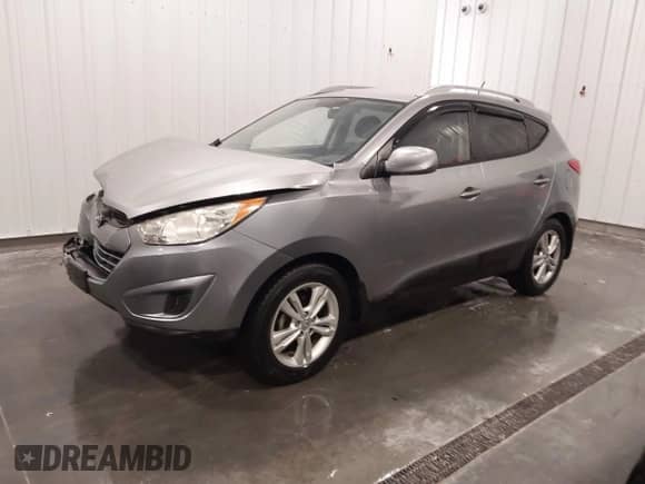 2011 Hyundai Tucson GLS z VIN KM8JU3AC7BU262415, wystawiony jako IAAI lot #43439786 z przebiegiem 88 234 mil mil oraz . Historia ofert i sprzedaży dostępna na DreamBid. Obrazek 2.