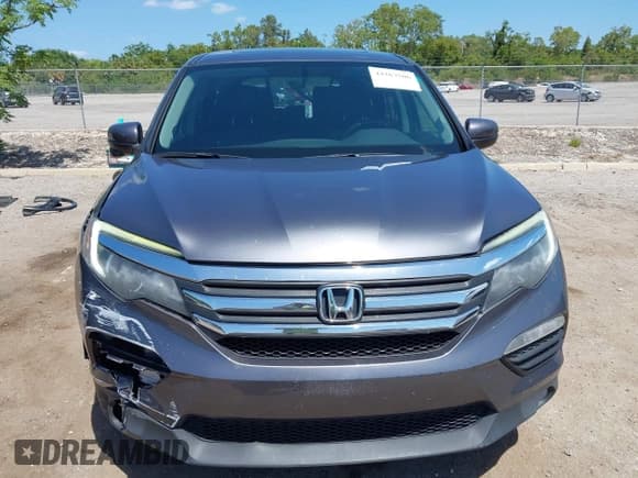 ✅ 2016 Honda Pilot EX-L • VIN: 5FNYF5H74GB059564 • Lot: 42167506. Listed on IAAI with 138,485 mi. Free auction sales archive from the USA and detailed vehicle history report at DreamBid. Image 12.