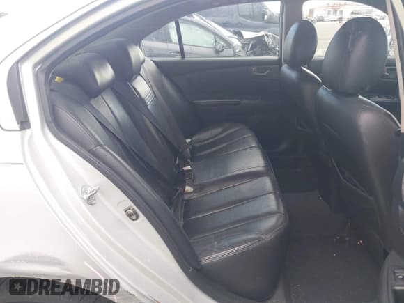 ✅ 2007 Kia Optima LX • VIN: KNAGE123075154280 • Lot: 43322468. Listed on IAAI with 220,638 mi. Free auction sales archive from the USA and detailed vehicle history report at DreamBid. Image 8.