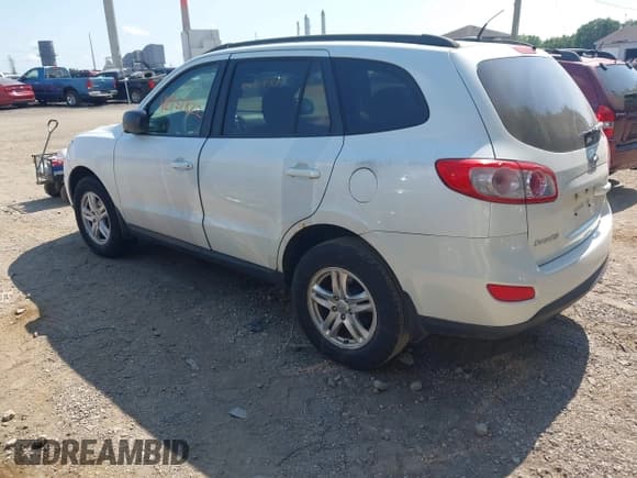 ✅ 2012 Hyundai Santa Fe GLS • VIN: 5XYZGDAG6CG117330 • Lot: 42951822. Listed on IAAI with 124,187 mi. Free auction sales archive from the USA and detailed vehicle history report at DreamBid. Image 3.