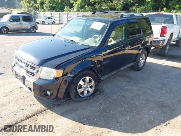 ✅ 2012 Ford Escape Limited • VIN: 1FMCU9EG7CKA73897 • Lot: 42601057. Listed on IAAI with 193,646 mi. Free auction sales archive from the USA and detailed vehicle history report at DreamBid. Image 6.
