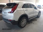 ✅ 2022 Cadillac XT4 FWD Premium Luxury • VIN: 1GYFZCR47NF100201 • Lot: 43403477. Listed on IAAI with 59,503 mi. Free auction sales archive from the USA and detailed vehicle history report at DreamBid. Image 4.