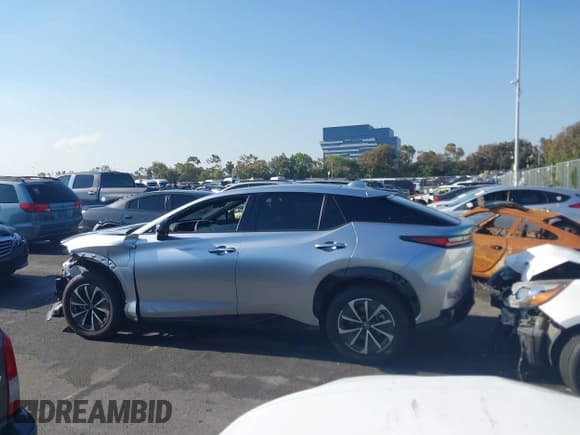 ✅ 2024 Lexus RZ 300e Premium • VIN: JTJABABBXRA003009 • Lot: 42297557. Listed on IAAI with 10,092 mi. Free auction sales archive from the USA and detailed vehicle history report at DreamBid. Image 14.