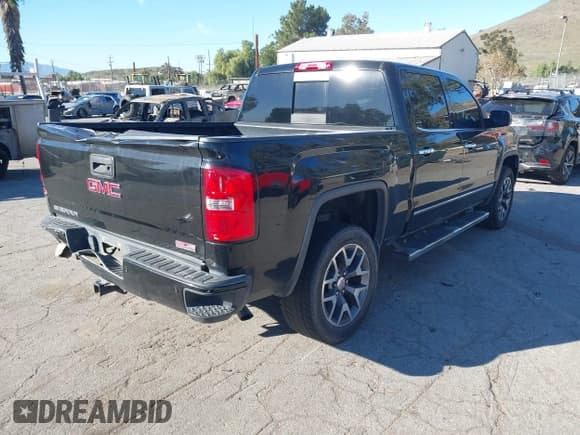 ✅ 2015 GMC Sierra 1500 SLT • VIN: 3GTU2VEC7FG108101 • Lot: 43852654. Listed on IAAI with 165,196 mi. Free auction sales archive from the USA and detailed vehicle history report at DreamBid. Image 4.