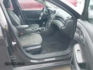 2015 Chevrolet Malibu LT z VIN 1G11D5SL0FF167535, wystawiony jako IAAI lot #43398139 z przebiegiem Nie podano mil oraz . Historia ofert i sprzedaży dostępna na DreamBid. Obrazek 5.