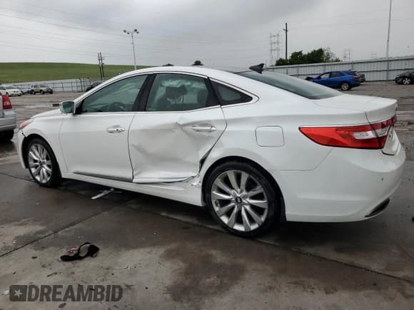 ✅ 2013 Hyundai Azera • VIN: KMHFH4JG6DA206540 • Лот: 59350095. Опубликован ранее на Copart с пробегом 65 579 миль. Бесплатный доступ к архиву аукционных продаж из США и подробный отчёт об истории автомобиля на DreamBid. Изображение 2.